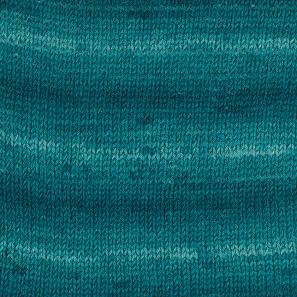 DROPS Fabel Long Print 918 Szmaragdowe miasto